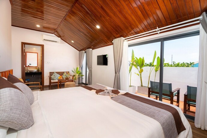 Imagen de la habitación del Hotel Tropical Home Villa. Foto 31