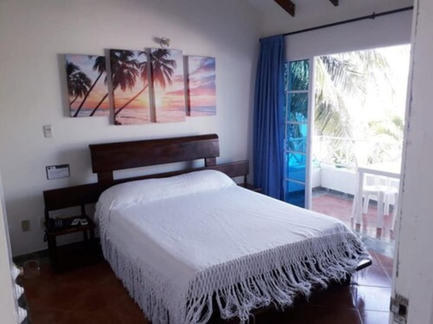 Imagen de la habitación del Hotel Tropical Inn. Foto 4