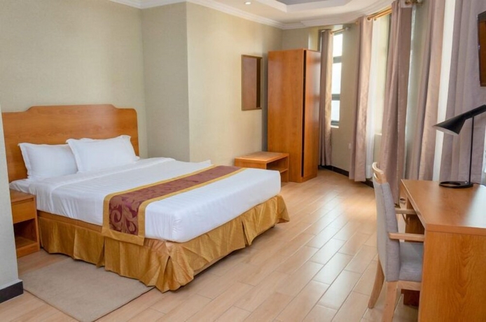 Imagen de la habitación del Hotel Tropical Plaza Apartments. Foto 5
