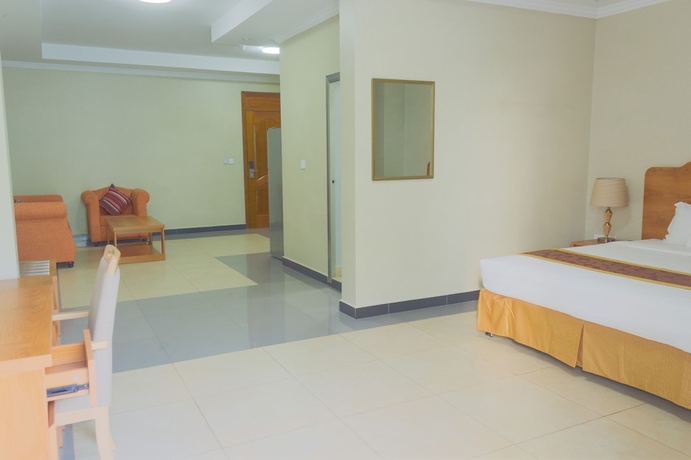Imagen de la habitación del Hotel Tropical Plaza Apartments. Foto 6