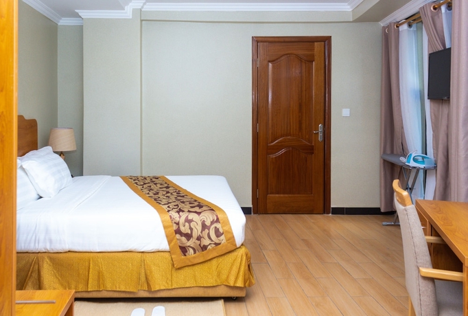 Imagen de la habitación del Hotel Tropical Plaza Apartments. Foto 9