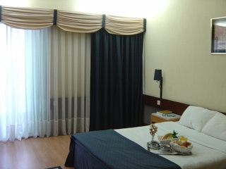 Imagen de la habitación del Hotel Tropical Promises Hotel. Foto 3