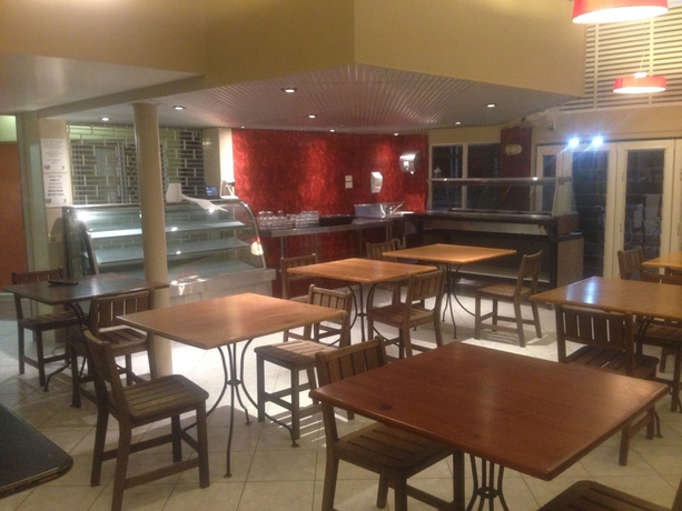 Imagen del bar/restaurante del Hotel Tropical Queenslander. Foto 7