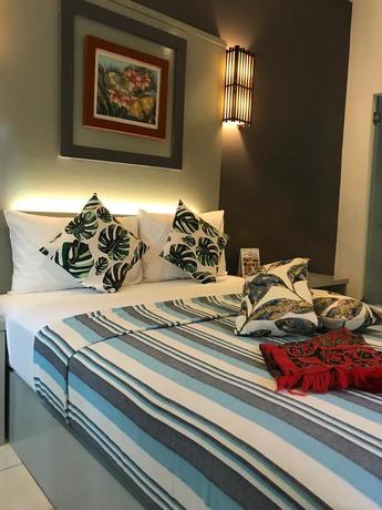 Imagen de la habitación del Hotel Tropical Resort Langkawi. Foto 8