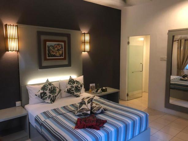 Imagen de la habitación del Hotel Tropical Resort Langkawi. Foto 9