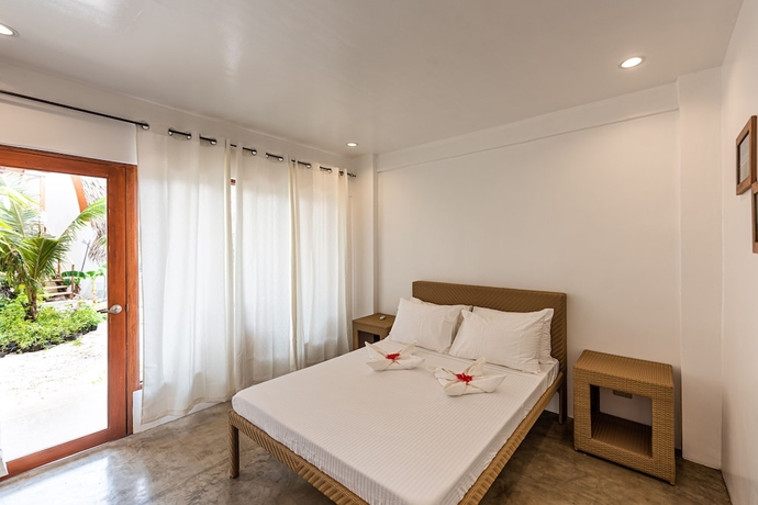 Imagen de la habitación del Hotel Tropical Temple Siargao. Foto 17