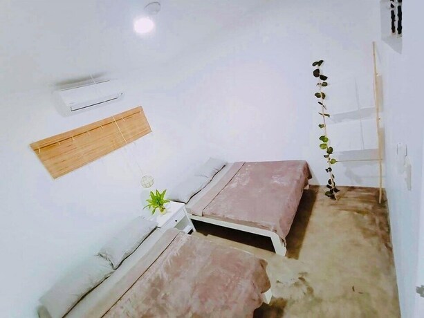 Imagen de la habitación del Hotel Tropical Vibes Inn Siargao. Foto 18