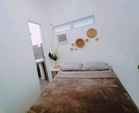 Imagen de la habitación del Hotel Tropical Vibes Inn Siargao. Foto 19