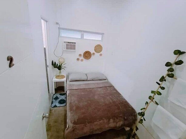 Imagen de la habitación del Hotel Tropical Vibes Inn Siargao. Foto 25