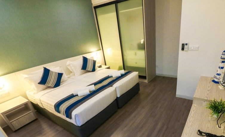 Imagen de la habitación del Hotel Tropical Villa Service Suite. Foto 3