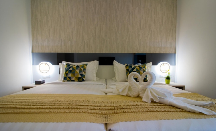 Imagen de la habitación del Hotel Tropical Villa Service Suite. Foto 4