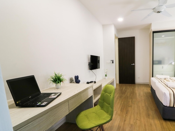 Imagen de la habitación del Hotel Tropical Villa Service Suite. Foto 6