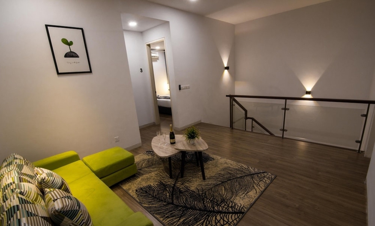 Imagen de la habitación del Hotel Tropical Villa Service Suite. Foto 11