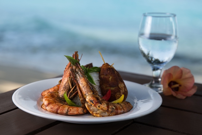 Imagen del bar/restaurante del Hotel Tropical Village. Foto 5