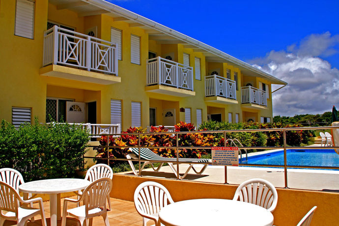 Imagen de la piscina del Hotel Tropical Winds Apartment. Foto 14