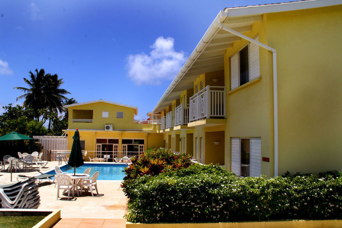 Imagen de la piscina del Hotel Tropical Winds Apartment. Foto 15