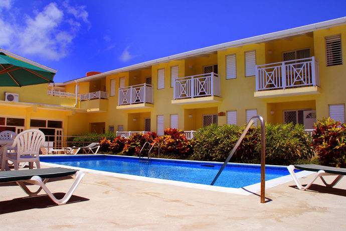 Imagen de la piscina del Hotel Tropical Winds Apartment. Foto 16