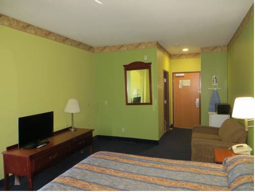 Imagen de la habitación del Hotel Tropicana Inn And Suites, Dallas. Foto 3