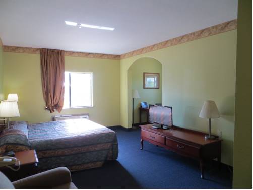 Imagen de la habitación del Hotel Tropicana Inn And Suites, Dallas. Foto 4