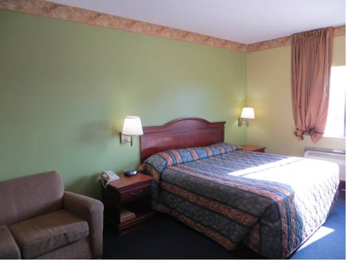 Imagen de la habitación del Hotel Tropicana Inn And Suites, Dallas. Foto 5