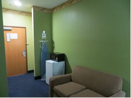 Imagen de la habitación del Hotel Tropicana Inn And Suites, Dallas. Foto 7