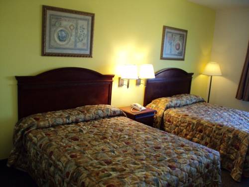 Imagen de la habitación del Hotel Tropicana Inn And Suites, Dallas. Foto 10