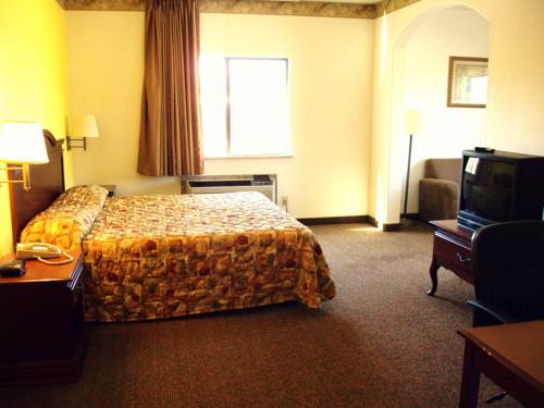 Imagen de la habitación del Hotel Tropicana Inn And Suites, Dallas. Foto 11