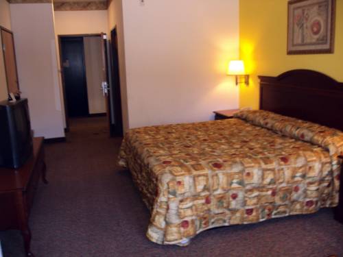 Imagen de la habitación del Hotel Tropicana Inn And Suites, Dallas. Foto 13