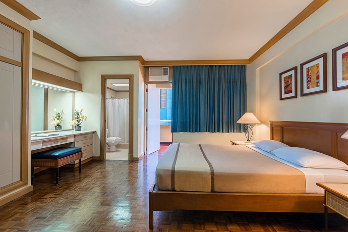 Imagen de la habitación del Hotel Tropicana Suites. Foto 4