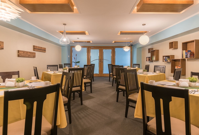 Imagen del bar/restaurante del Hotel Tropicana Suites. Foto 2