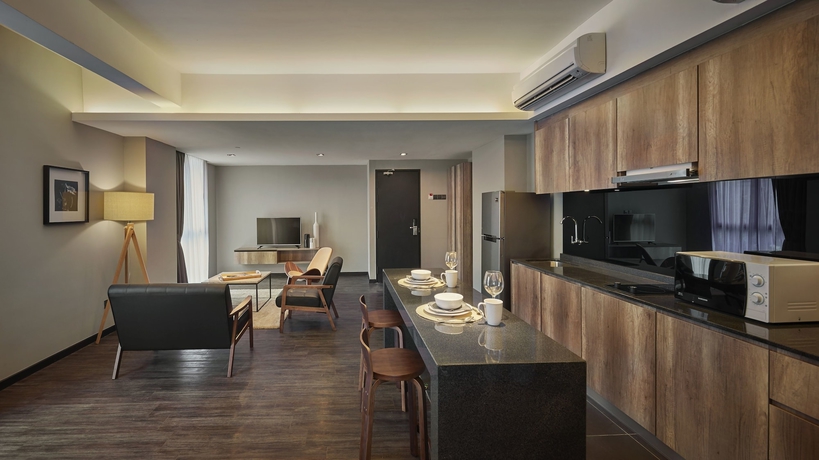 Imagen de la habitación del Hotel Tropics Eight Suites. Foto 3