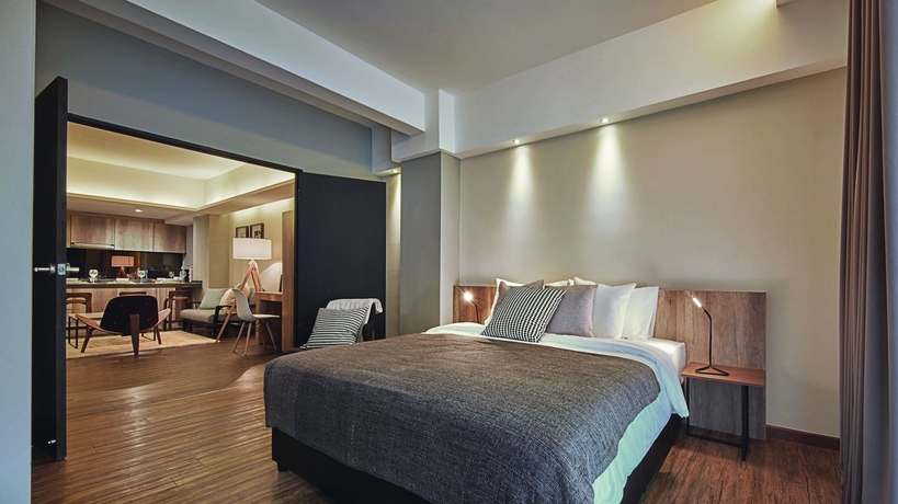 Imagen de la habitación del Hotel Tropics Eight Suites. Foto 8