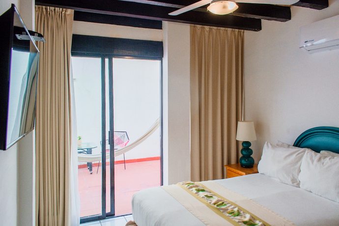 Imagen de la habitación del Hotel Tropicus Boutique. Foto 4