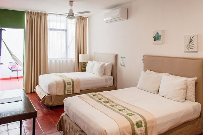 Imagen de la habitación del Hotel Tropicus Boutique. Foto 5