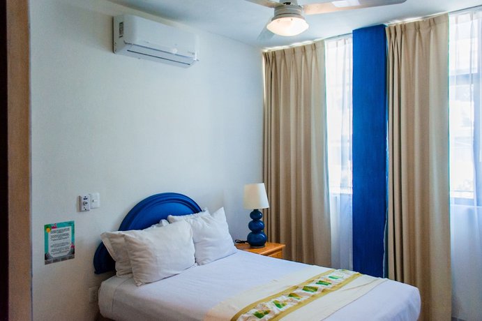 Imagen de la habitación del Hotel Tropicus Boutique. Foto 7