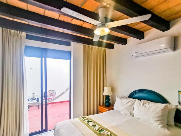 Imagen de la habitación del Hotel Tropicus Boutique. Foto 10
