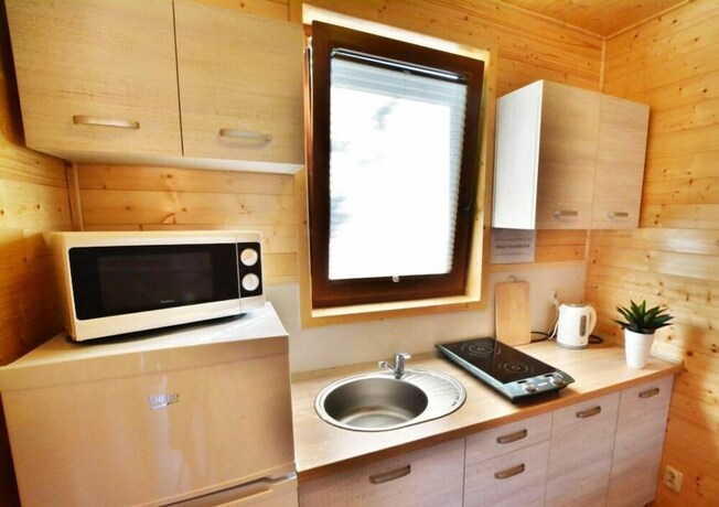Imagen de la habitación del Hotel Tropikana Domki Apartamenty. Foto 9