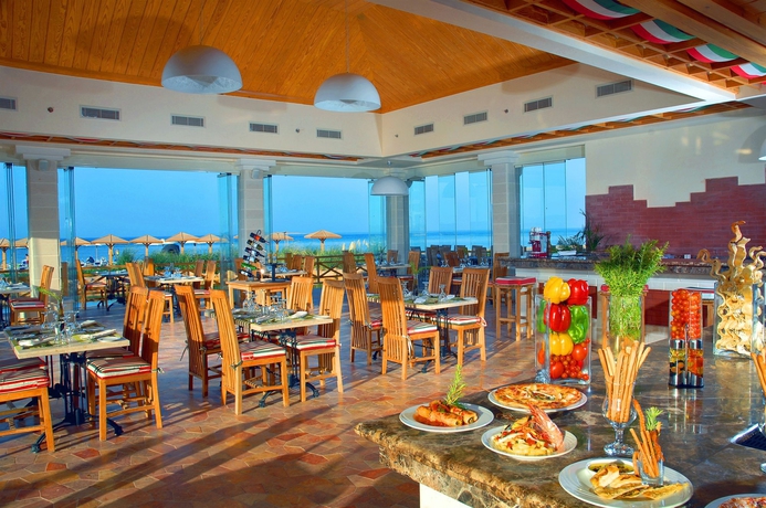 Imagen del bar/restaurante del Hotel Tropitel Sahl Hasheesh Resort. Foto 8