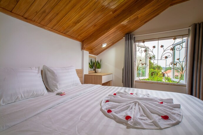 Imagen de la habitación del Hotel Truc Loc Villa. Foto 15