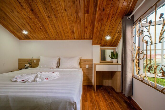 Imagen de la habitación del Hotel Truc Loc Villa. Foto 22