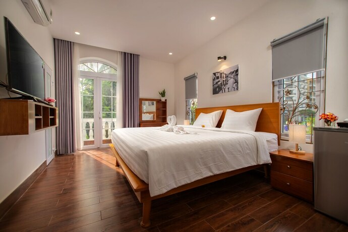 Imagen de la habitación del Hotel Truc Loc Villa. Foto 25