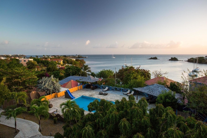 Imagen de la habitación del Hotel True Blue Bay Resort. Foto 6