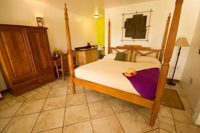 Imagen de la habitación del Hotel True Blue Bay Resort. Foto 9