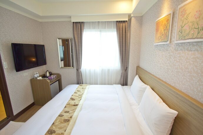 Imagen de la habitación del Hotel True Friend. Foto 17