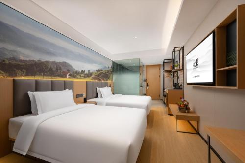 Imagen general del Hotel True Go - Shenzhen Futian Huaqiang North. Foto 1