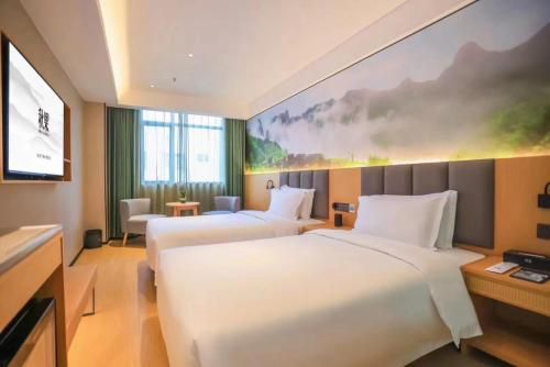 Imagen de la habitación del Hotel True Go - Shenzhen Futian Huaqiang North. Foto 17
