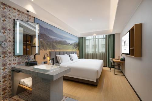 Imagen de la habitación del Hotel True Go - Shenzhen Futian Huaqiang North. Foto 20