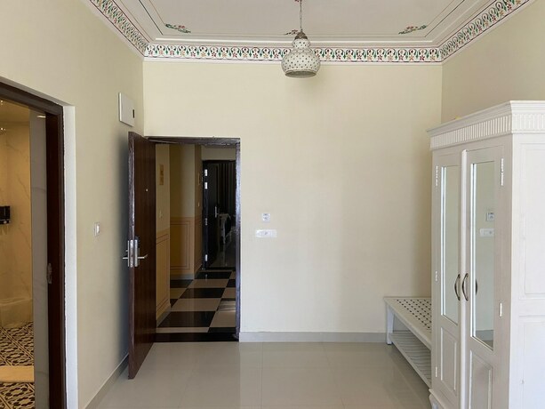 Imagen de la habitación del Hotel Trulyy The Shakti Vilas. Foto 18