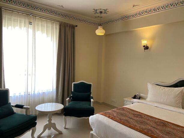 Imagen de la habitación del Hotel Trulyy The Shakti Vilas. Foto 19