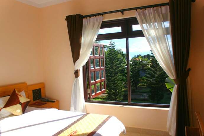 Imagen de la habitación del Hotel Trung Nguyen Coffee Resort. Foto 24